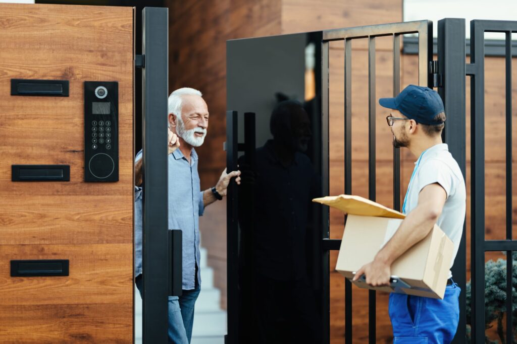Best Video Doorbells That Don’t Need Internet: Top Picks & Buyer’s Guide 3 happy senior man communicating with courier who is delivering packages his home
